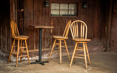 Wooden bar stools and bar table in calico ghost town