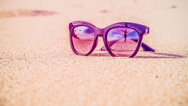 Happy Beautiful Girl Reflecting in Sunglasses on Sand Beach, Bali
