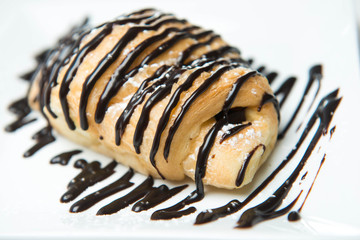 Sweet croissant with chocolate.