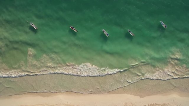 aerial view of beach and boats