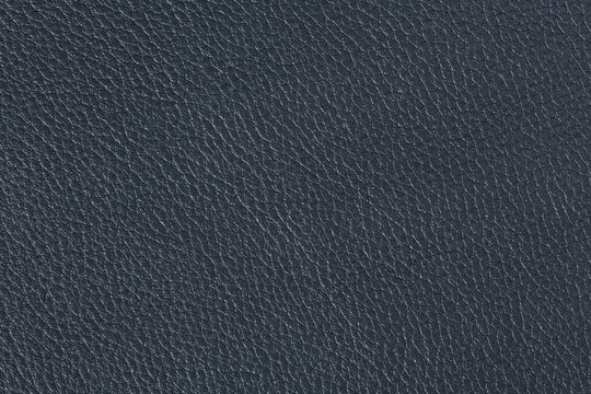 Dark luxury blue leather abstract texture.