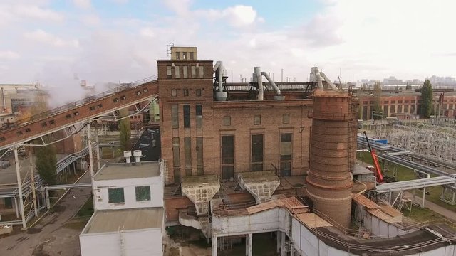 Old crumbling thermal power station, built in the Soviet Union. 4K