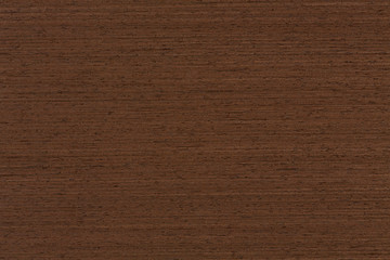 Surface of wenge wood background for design and decoration.