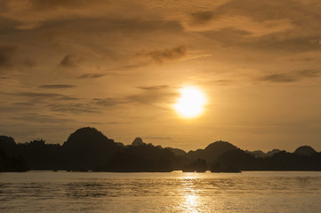 Naklejka premium Raja Ampat, Indonesia. Raja Ampat, is an archipelago comprising over 1,500 small islands comprising hundreds of jungle-covered islands, and is known for its coral reefs rich with marine life.