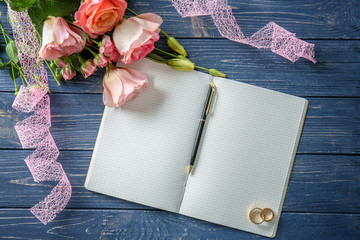 Wedding to do list with flowers on table