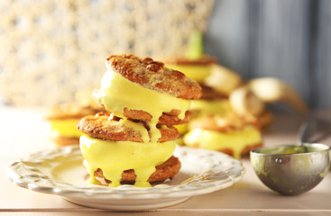 Delicious lemon ice cream cookie sandwiches on kitchen table