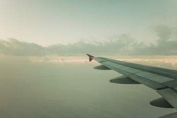 View from plane window, cloud sky