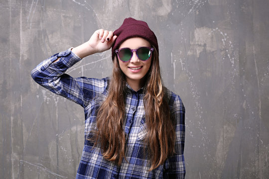 Pretty teenager girl on color background