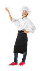 Cute girl in chef uniform on white background
