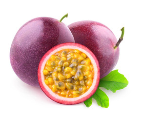 Isolated maracuya. Two whole passion fruits and a half isolated on white background with clipping...