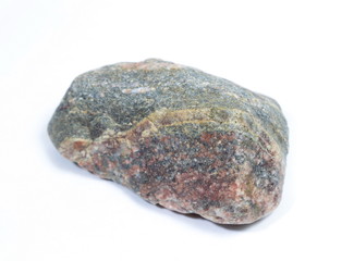 Single natural stone on white background