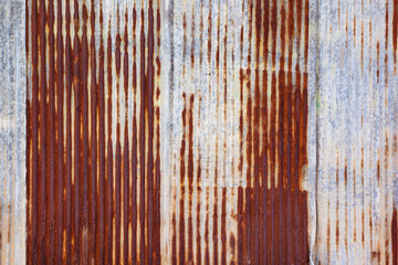 Rusting metal fencing or siding