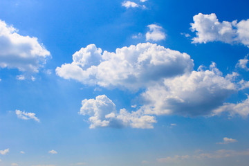 Naklejka na ściany i meble White clouds in the blue sky