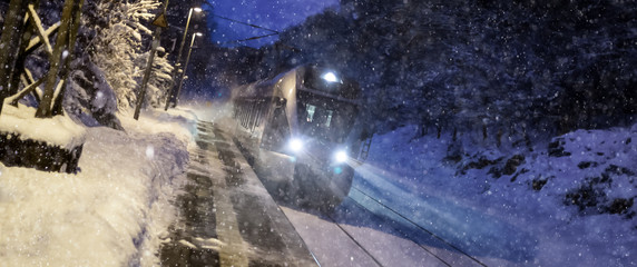 train speeding in a snowy winter night