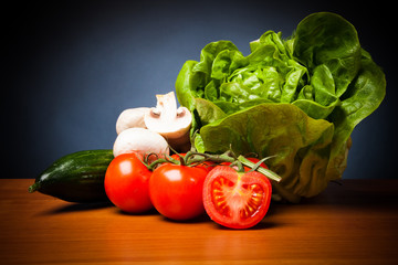 Mixed Vegetabales On Table In Front Of Black Background