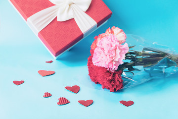 Valentines Concept, Carnations Bouquet and Red Present Box with