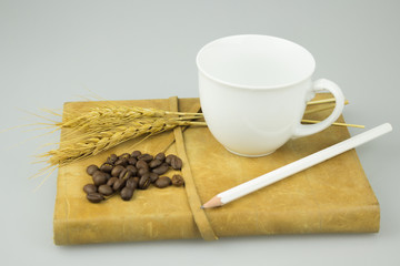 Coffee cup and office supplies. Isolated on white background.