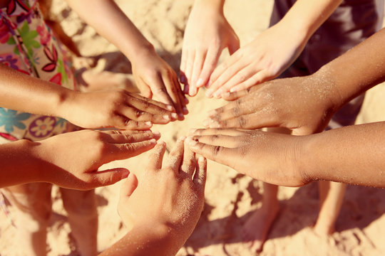 Multicultural childrens hands in a circle. Instagram effect