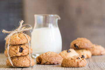 Oatmeal Raisin Cookies on a Plate with Glass of Milk