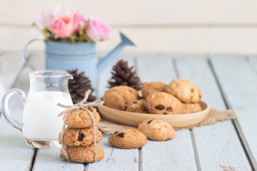 Oatmeal Raisin Cookies on a Plate with Glass of Milk
