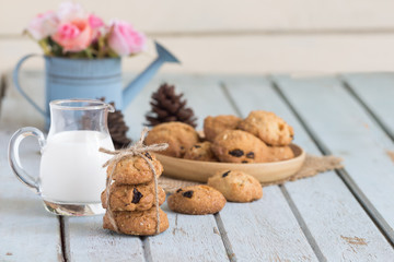 Oatmeal Raisin Cookies on a Plate with Glass of Milk
