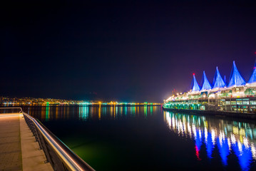 Fototapeta na wymiar Burrard Inlet Waterfront, Vancouver. The Vancouver Trade and Convention Center also known as 