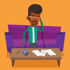 Unhappy african man accounting home bills.