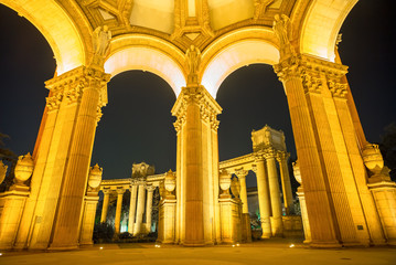Arches inside the Palace of Fine Arts Museum at Night in San Francisco, California, USA