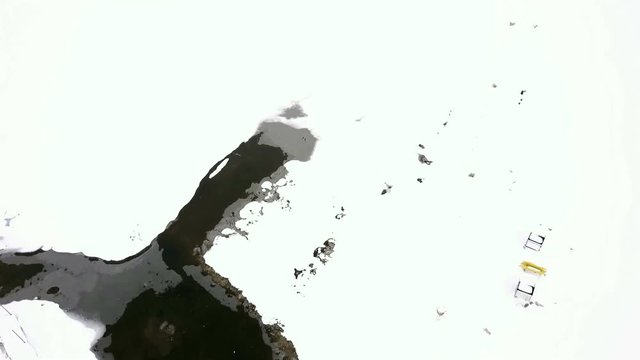 Aerial view of frozen marina in the mountains