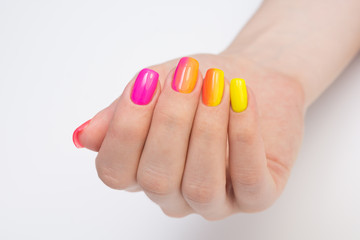 Amazing manicure and natural nails with gel polish. Attractive modern nail art design.