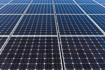 Solar panels on the roof of the building, alternative sources of electricity, advanced technology.