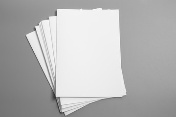 Blank portrait A4. brochure magazine isolated on gray, changeable background / white paper isolated...