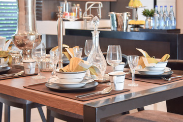 elegant table set in modern style dining room interior