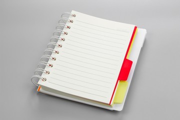white blank note paper on gray background