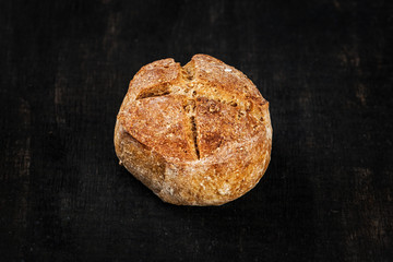 bread roll on a wooden background