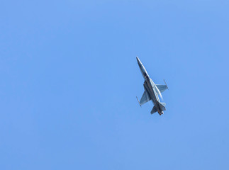 military fighter jet aircraft  flying blue sky background