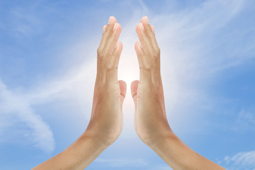 hand sign with blue sky background