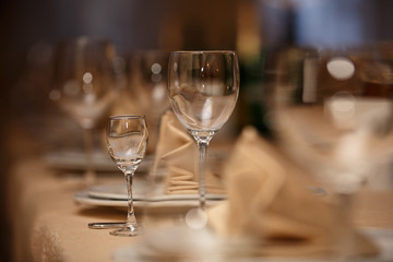 Glasses for alcoholic drinks on table