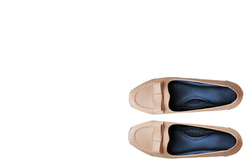Brown women's shoes on a white background.
