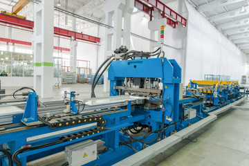 machine for the manufacture of metalic parts for  refrigerator