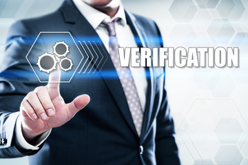 Business, technology, internet concept on hexagons and transparent honeycomb background. Businessman  pressing button on touch screen interface and select  verification