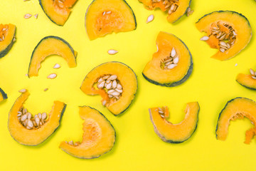 sliced fresh asian pumpkin pattern on vibrant color background