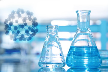 carbon fullerene chemical structure with two flask in science bl