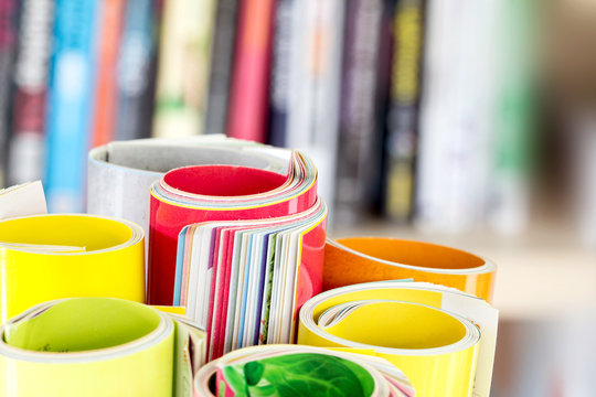 Close up edge of colorful magazine stacking roll 