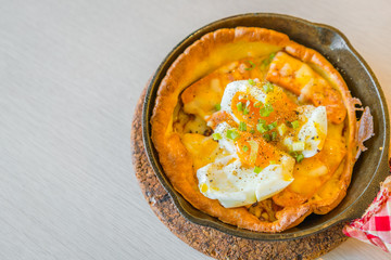 Hot Pizza with egg for breakfast .