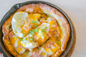 Hot Pizza with egg for breakfast .