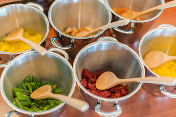 Salads on buffet table at restaurant .