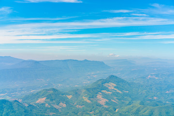 Obraz premium Mountains under clouds. View from the airplane .