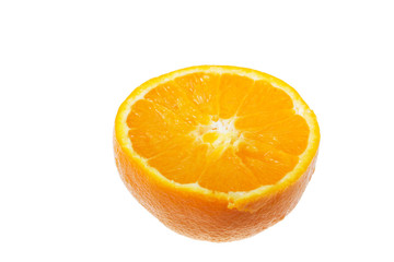 Ripe slice of orange on a white background