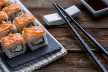 Delicious fresh rolls with salmon closeup